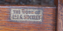 L & J G Stickley decal signature reading "The Work of L & J G Stickley". 1912-1918. All 8 chairs are signed. 
